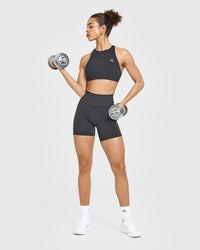 EasyLift™ High Neck Sports Bra with White Logo | Coal