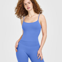 SoftMotion™ Strappy Mid Vest with Built in Bra Shelf with White Logo | Glaucous Blue