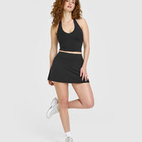 SoftMotion™ Halter Neck Mid Vest with Built in Bra Shelf with White Logo | Soft Black