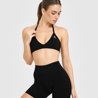 EnhanceLift™ Seamless Minimal Halter Neck Bralette with White Logo | Black