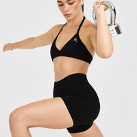 EnhanceLift™ Seamless Minimal Halter Neck Bralette with White Logo | Black