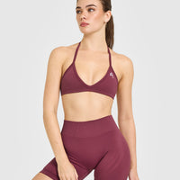 EnhanceLift™ Seamless Minimal Halter Neck Bralette with White Logo | Burnt Maroon