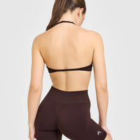 EnhanceLift™ Seamless Minimal Halter Neck Bralette with White Logo | Plum Brown