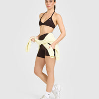EnhanceLift™ Seamless Minimal Halter Neck Bralette with White Logo | Plum Brown