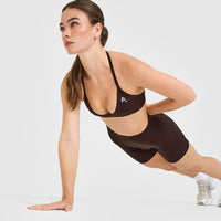 EnhanceLift™ Seamless Minimal Halter Neck Bralette with White Logo | Plum Brown