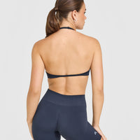 EnhanceLift™ Seamless Minimal Halter Neck Bralette with White Logo | True Blue