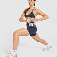 EnhanceLift™ Seamless Minimal Halter Neck Bralette with White Logo | True Blue