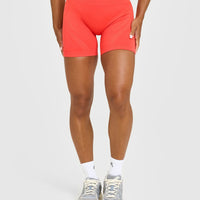 EnhanceLift™ Seamless Shorts with White Logo | Charged Coral