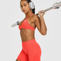 EnhanceLift™ Seamless Shorts with White Logo | Charged Coral