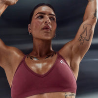 EnhanceLift™ Seamless Strappy Sports Bra with White Logo | Burnt Maroon