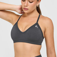 EnhanceLift™ Seamless Strappy Sports Bra with White Logo | Coal