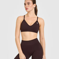 EnhanceLift™ Seamless Strappy Sports Bra with White Logo | Plum Brown