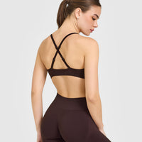 EnhanceLift™ Seamless Strappy Sports Bra with White Logo | Plum Brown