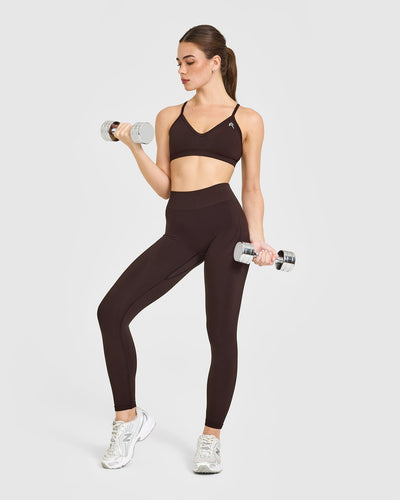 EnhanceLift™ Seamless Strappy Sports Bra with White Logo | Plum Brown