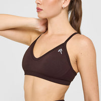 EnhanceLift™ Seamless Strappy Sports Bra with White Logo | Plum Brown