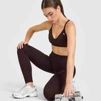 EnhanceLift™ Seamless Strappy Sports Bra with White Logo | Plum Brown