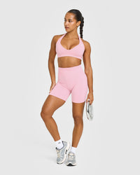 Effortless Seamless Halter Neck Sports Bra with White Logo | Petal Pink