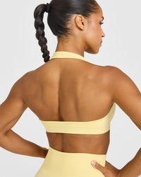 Effortless Seamless Halter Neck Sports Bra with White Logo | Sherbert Yellow