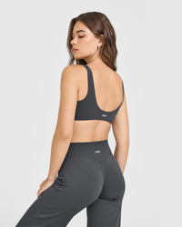 SoftMotion™ Scoop Back Bralette with White Logo | Coal
