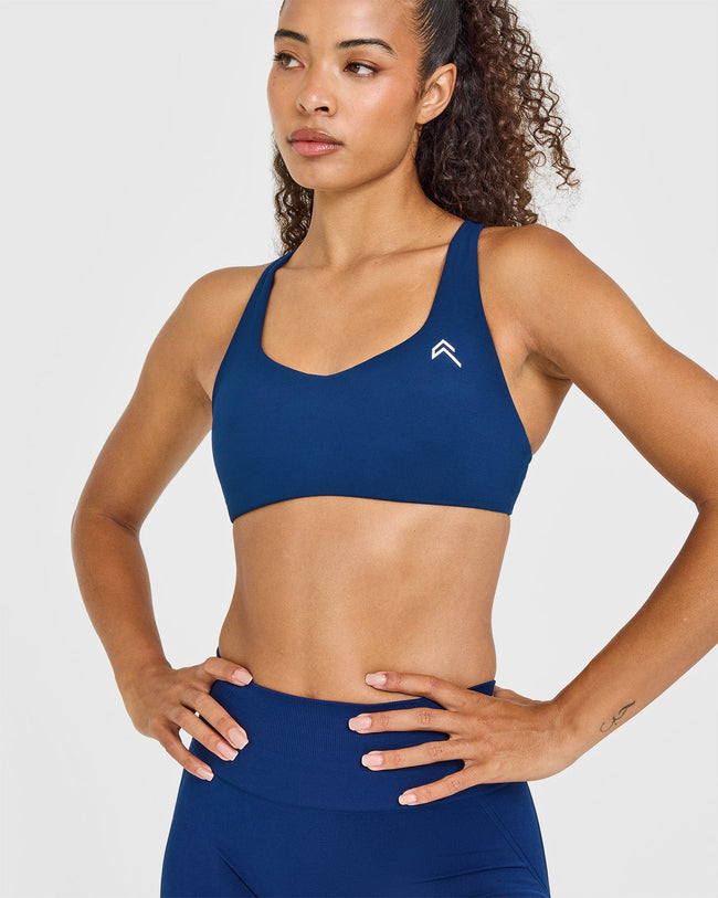EasyLift™ Cross Back Sports Bra with White Logo | Midnight
