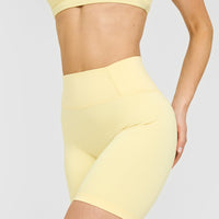 Timeless High Waisted Shorts with White Logo | Sherbert Yellow
