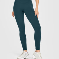 SoftMotion™ High Waisted Leggings with White Logo | Oil Blue