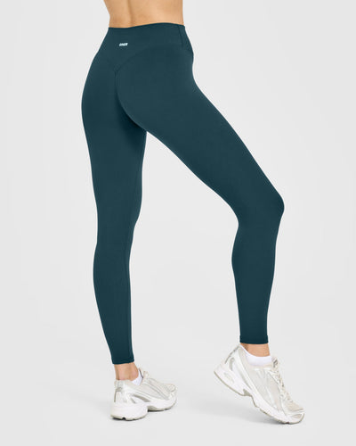 SoftMotion™ High Waisted Leggings with White Logo | Oil Blue