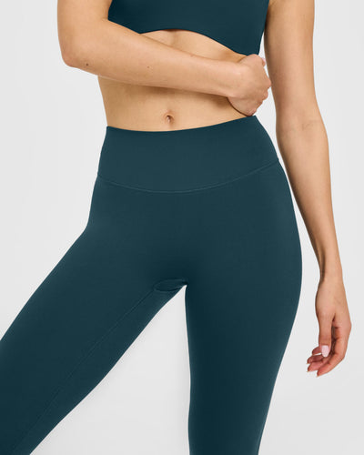 SoftMotion™ High Waisted Leggings with White Logo | Oil Blue