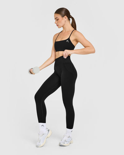 EasyLift™ Strappy Sports Bra with White Logo | Black