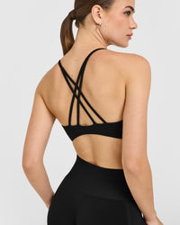 EasyLift™ Strappy Sports Bra with White Logo | Black