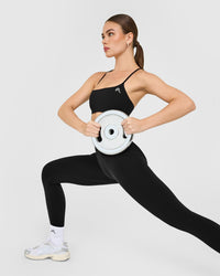 EasyLift™ Strappy Sports Bra with White Logo | Black