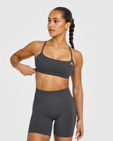 EasyLift™ Strappy Sports Bra with White Logo | Coal