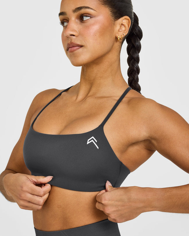 EasyLift™ Strappy Sports Bra with White Logo | Coal