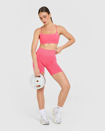 EasyLift™ Strappy Sports Bra with White Logo | Hot Girl Pink