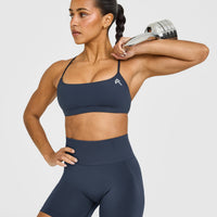 EasyLift™ Strappy Sports Bra with White Logo | True Blue