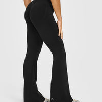Effortless Seamless Flared Bottoms with White Logo | Black