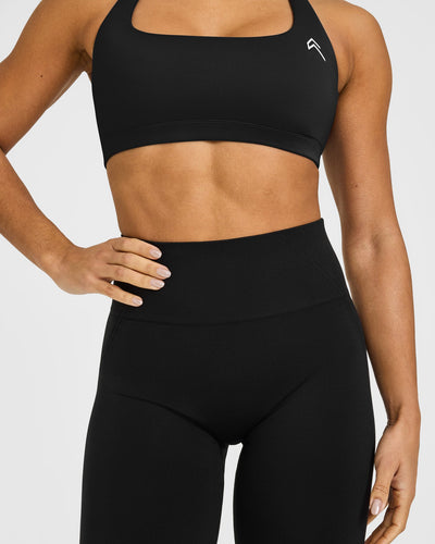 Effortless Seamless Flared Bottoms with White Logo | Black