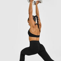 Effortless Seamless Flared Bottoms with White Logo | Black