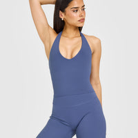 SoftMotion™ Halter Neck Mid Vest with Built in Bra Shelf with White Logo | Slate Blue