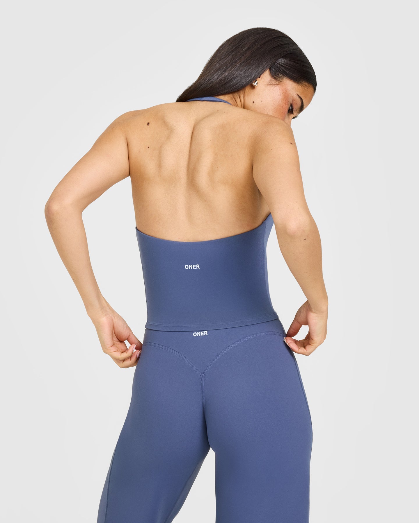 SoftMotion™ Halter Neck Mid Vest with Built in Bra Shelf with White Logo | Slate Blue