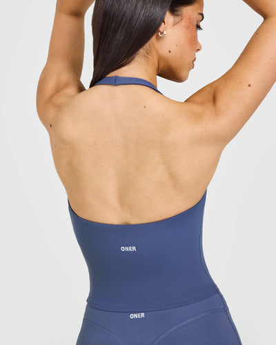 SoftMotion™ Halter Neck Mid Vest with Built in Bra Shelf with White Logo | Slate Blue