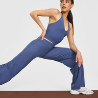 SoftMotion™ Halter Neck Mid Vest with Built in Bra Shelf with White Logo | Slate Blue