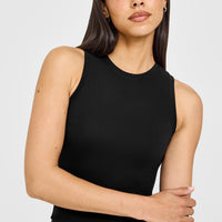 SoftMotion™ High Neck Mid Vest with White Logo | Black