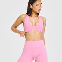 SoftMotion™ Minimal Halter Neck Bralette with White Logo | Rose Pink