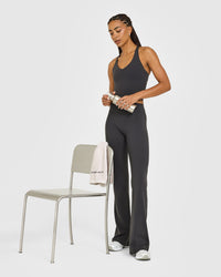 SoftMotion™ Racer Back Mid Vest with Built in Bra Shelf with White Logo | Coal