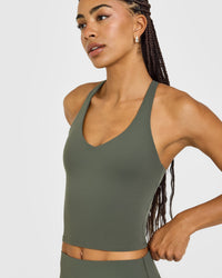 SoftMotion™ Racer Back Mid Vest with Built in Bra Shelf with White Logo | Dark Khaki