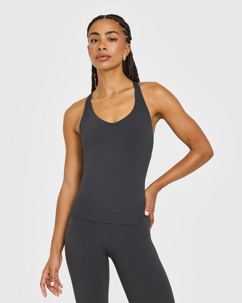 Oner Modal SoftMotion™ Racer Back Vest with Built in Bra Shelf with White Logo | Coal