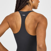 SoftMotion™ Racer Back Vest with Built in Bra Shelf with White Logo | Coal
