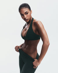 SoftMotion™ Minimal Halter Neck Bralette with Gray Logo | Emerald Noir