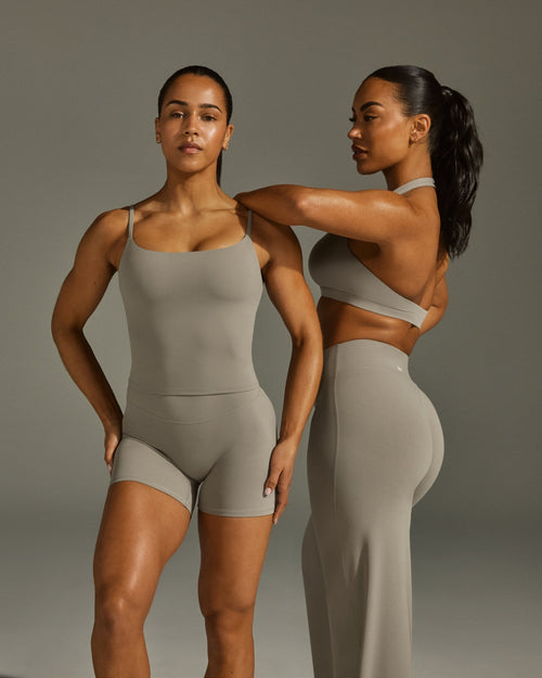 SoftMotion™ Strappy Mid Tank Top with Built in Bra Shelf with White Logo | Warm Sand